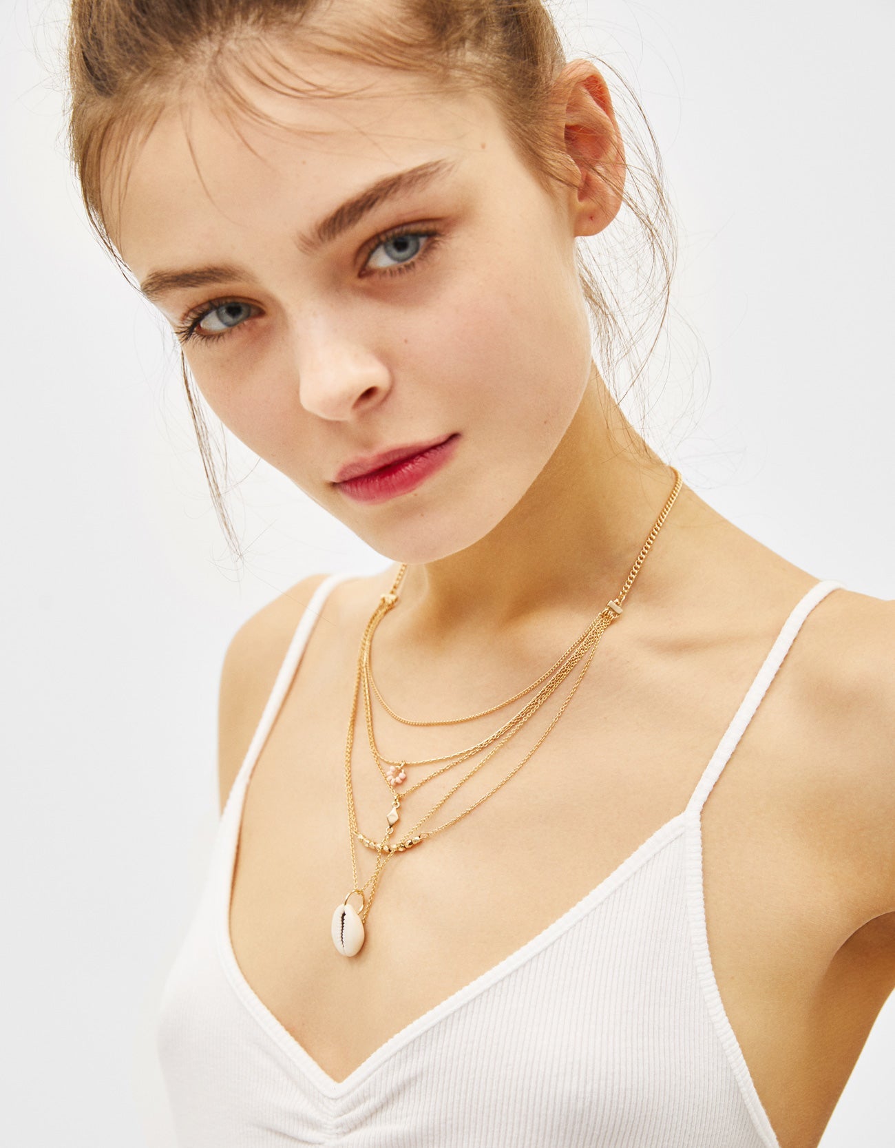 Multi-strand chain necklace with seashell